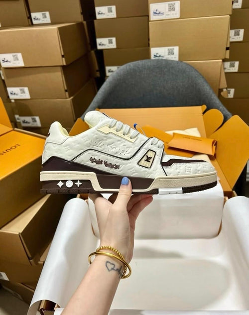 LV Trainer Stamped Logo