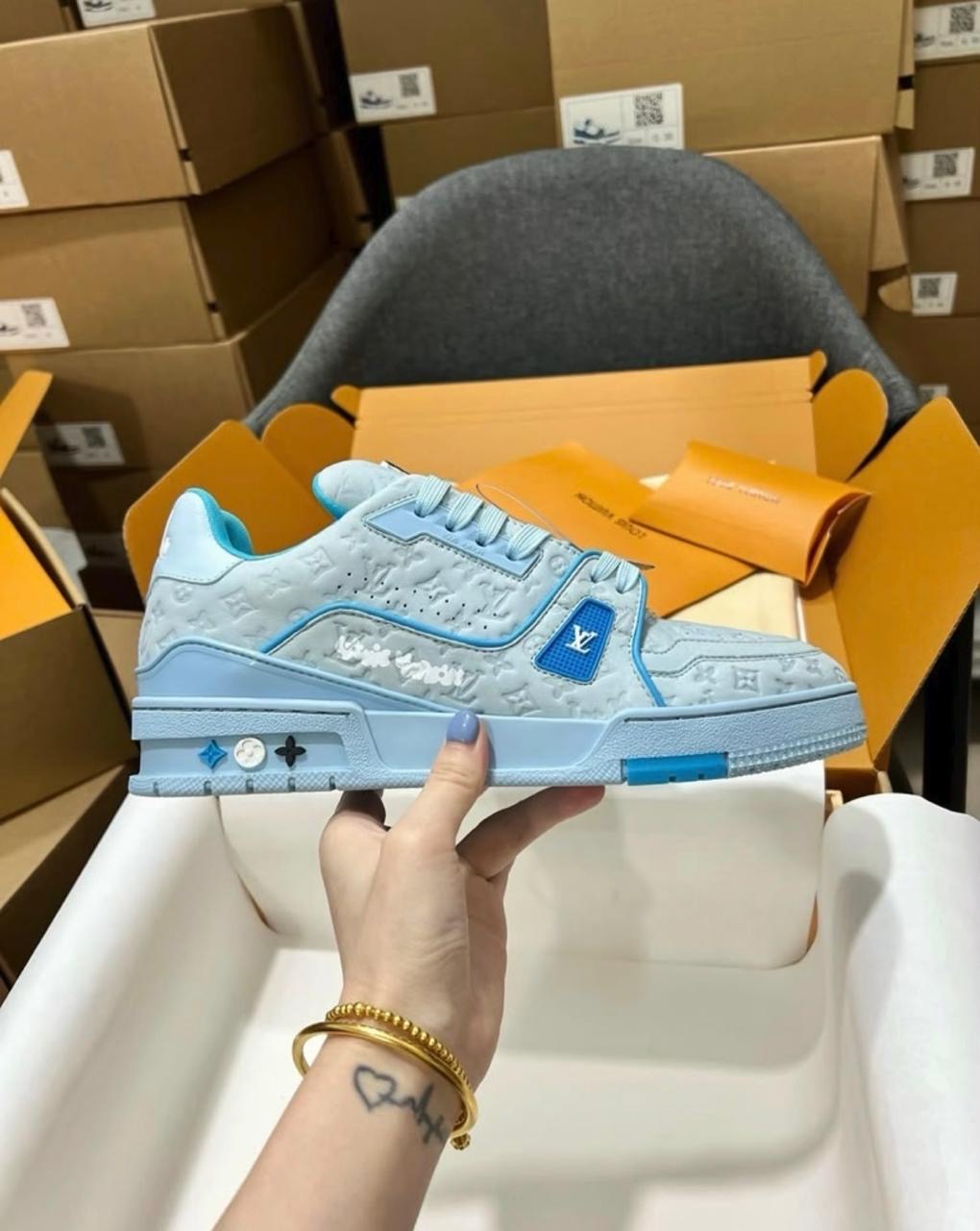 LV Trainer Stamped Logo